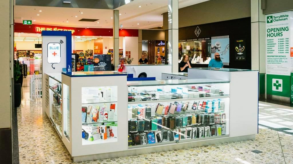 The whole kiosk in the Winmalee Village mall with a wall of phone cases